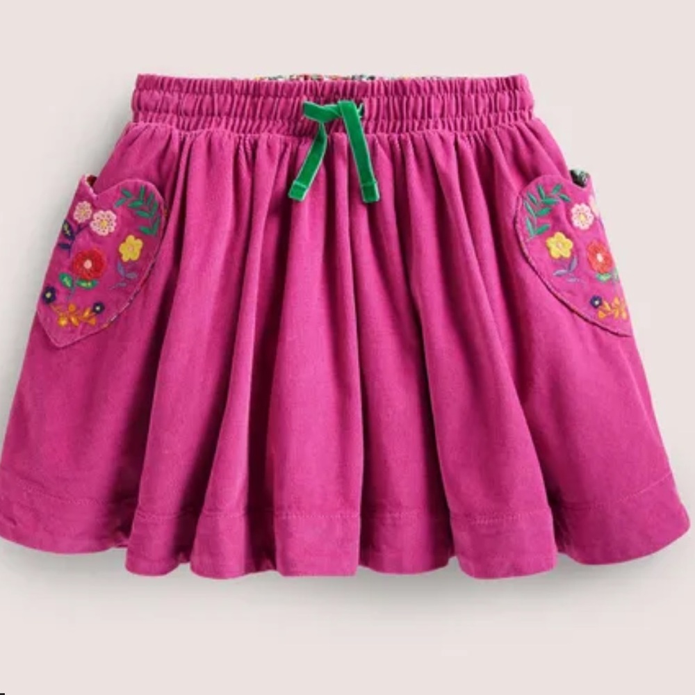 Embroidered woven twirly skirt in shocking pink